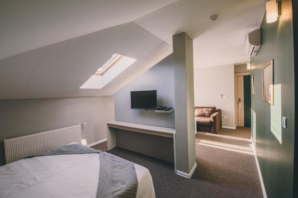 Posteľ alebo postele v izbe v ubytovaní Hotel Nova Bentbaša