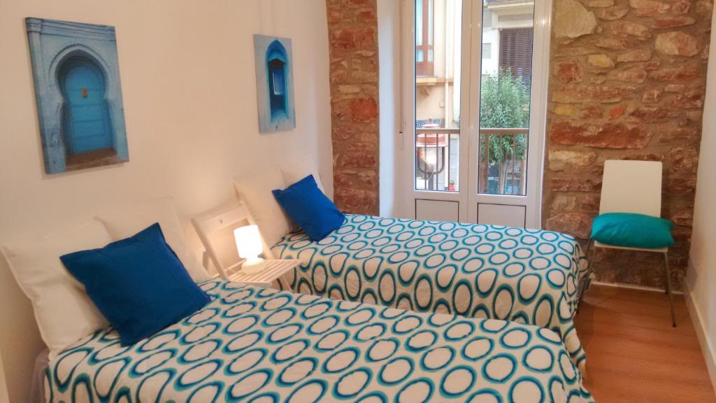 Posteľ alebo postele v izbe v ubytovaní Matia apartamento