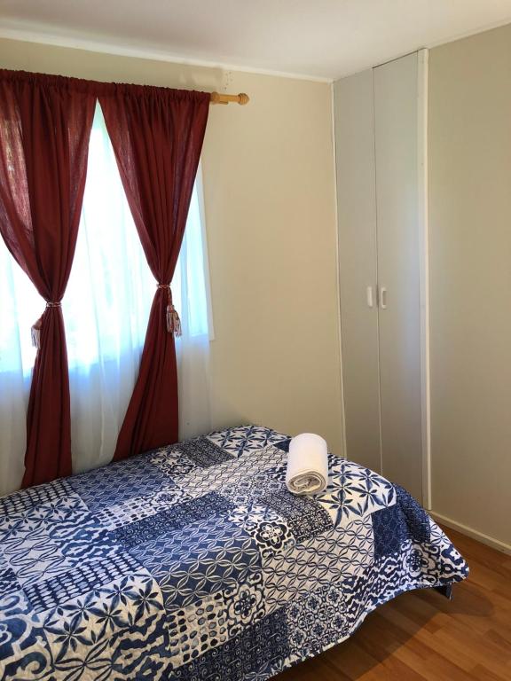 Postel nebo postele na pokoji v ubytování Cabañas Los Laureles - Lican Ray