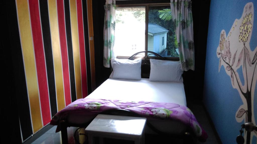 Postel nebo postele na pokoji v ubytování Mr. Clean Guesthouse