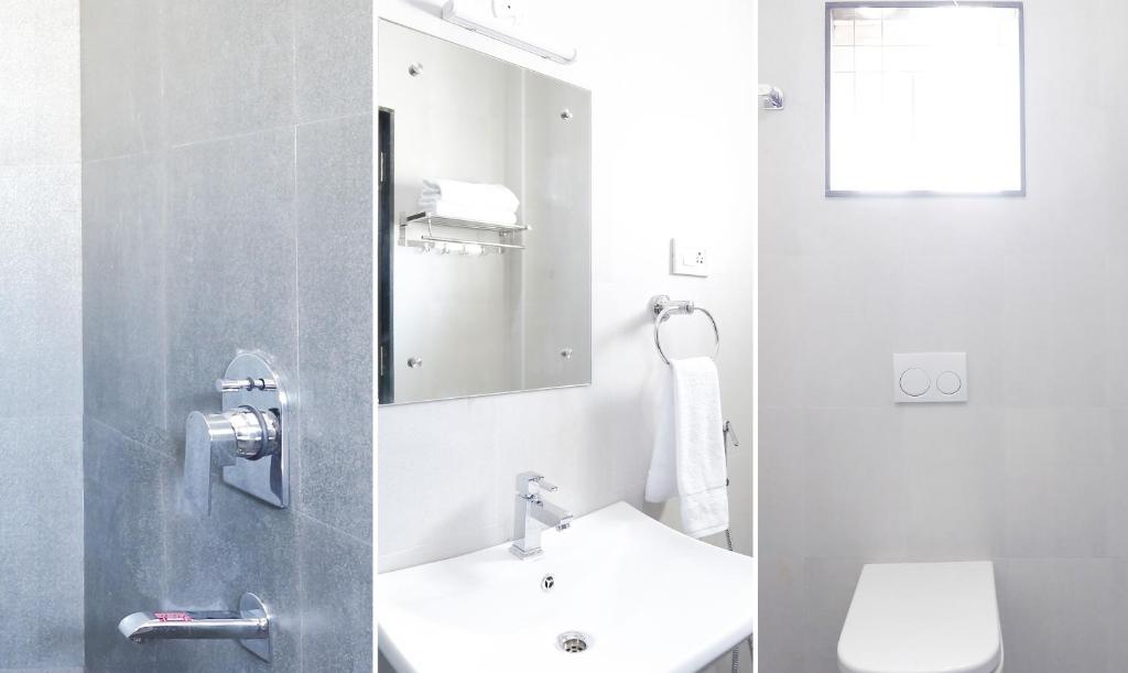 Koupelna v ubytování Treebo Hi Line Apartments Kalapatti
