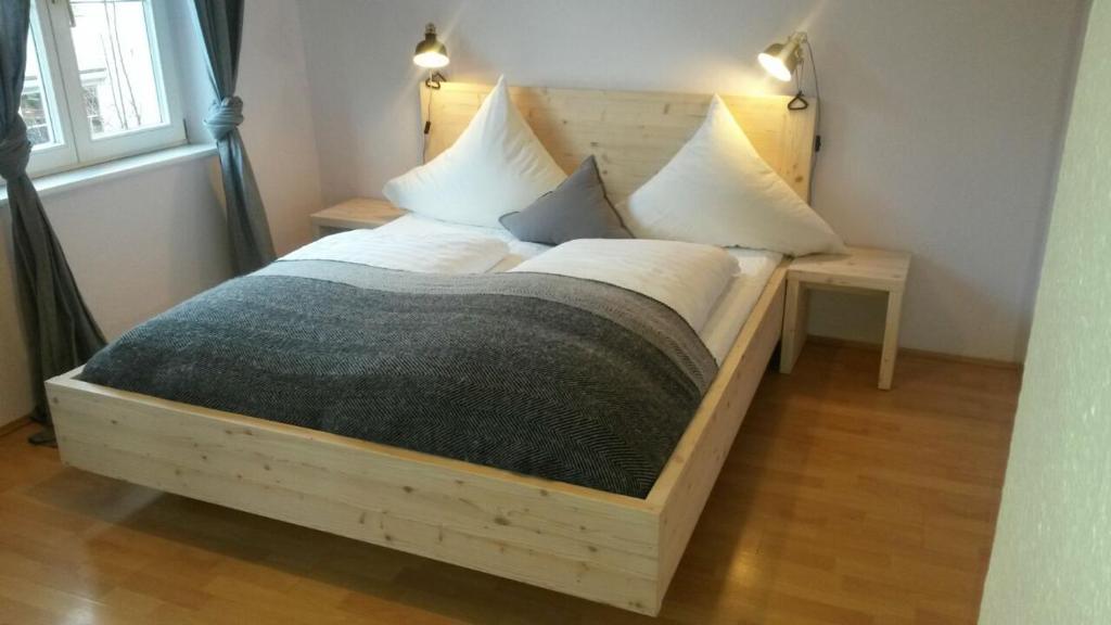 Postel nebo postele na pokoji v ubytování K-Hotel (Grüner Baum)
