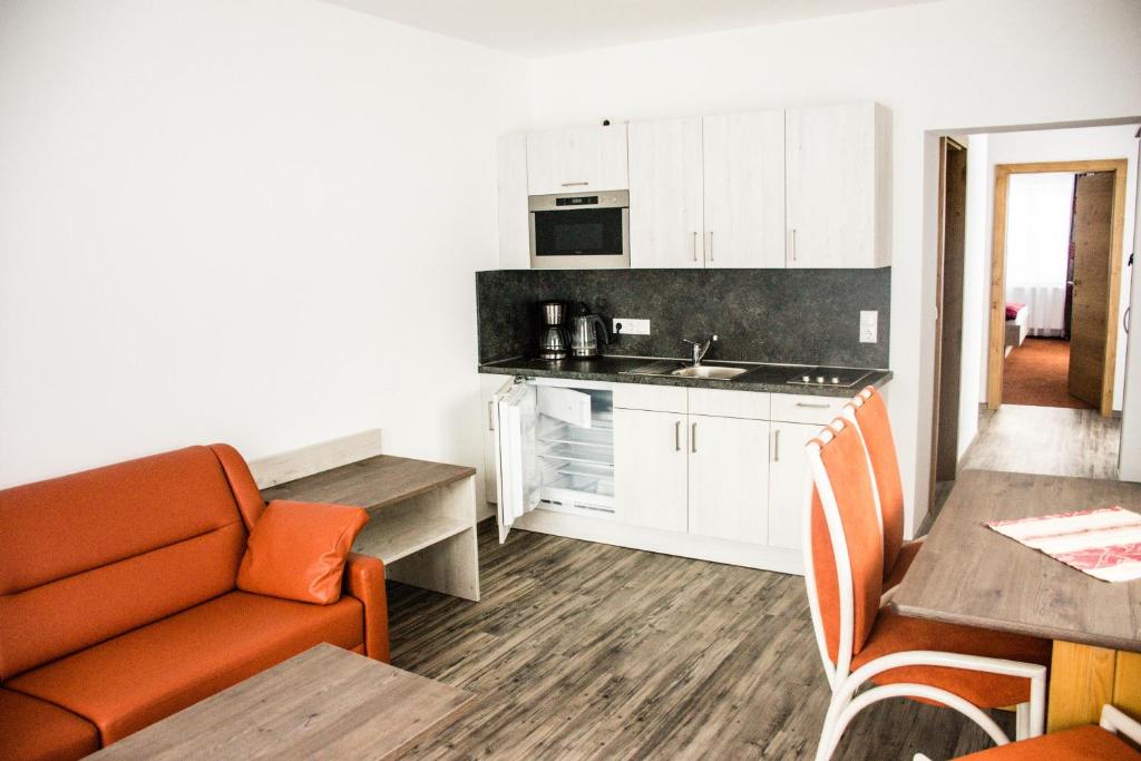 Kuchyň nebo kuchyňský kout v ubytování Apartment Bergsee