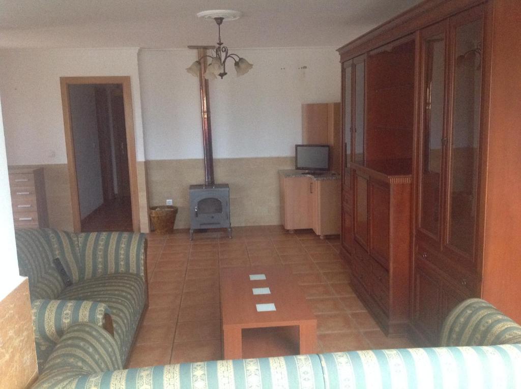 TV a/nebo společenská místnost v ubytování Casa As Pedreiras