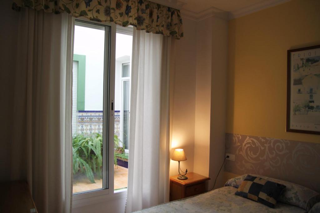 Postel nebo postele na pokoji v ubytování Hostal Ana - Adults Recommended