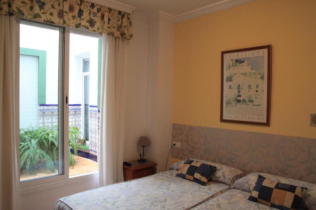 Postel nebo postele na pokoji v ubytování Hostal Ana - Adults Recommended