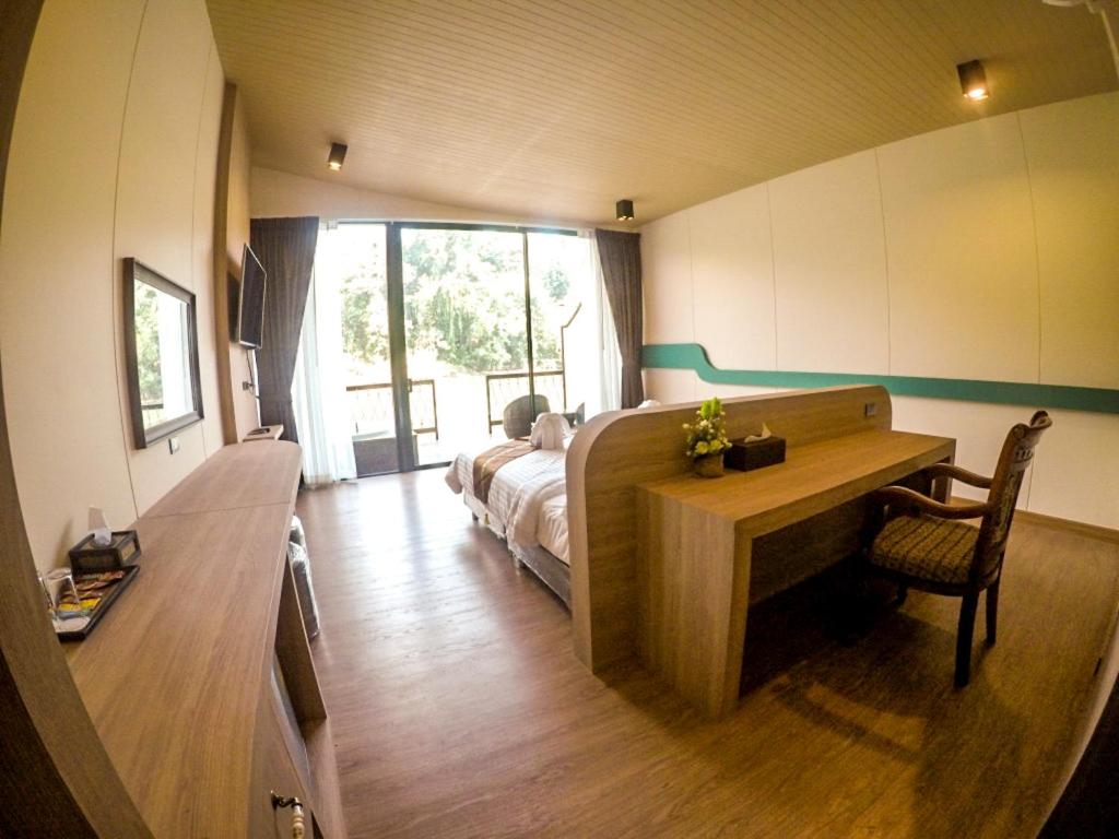 TV a/nebo společenská místnost v ubytování Binlha Raft Resort