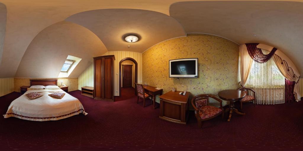 TV a/nebo společenská místnost v ubytování Hotel Elefant