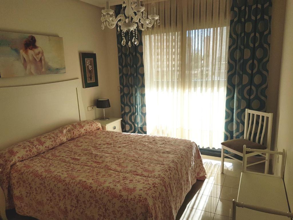 Posteľ alebo postele v izbe v ubytovaní GEMELOS 26 APARTMENTS - Benidormland