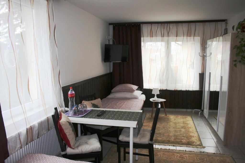 Postel nebo postele na pokoji v ubytování Fontana Vendégház