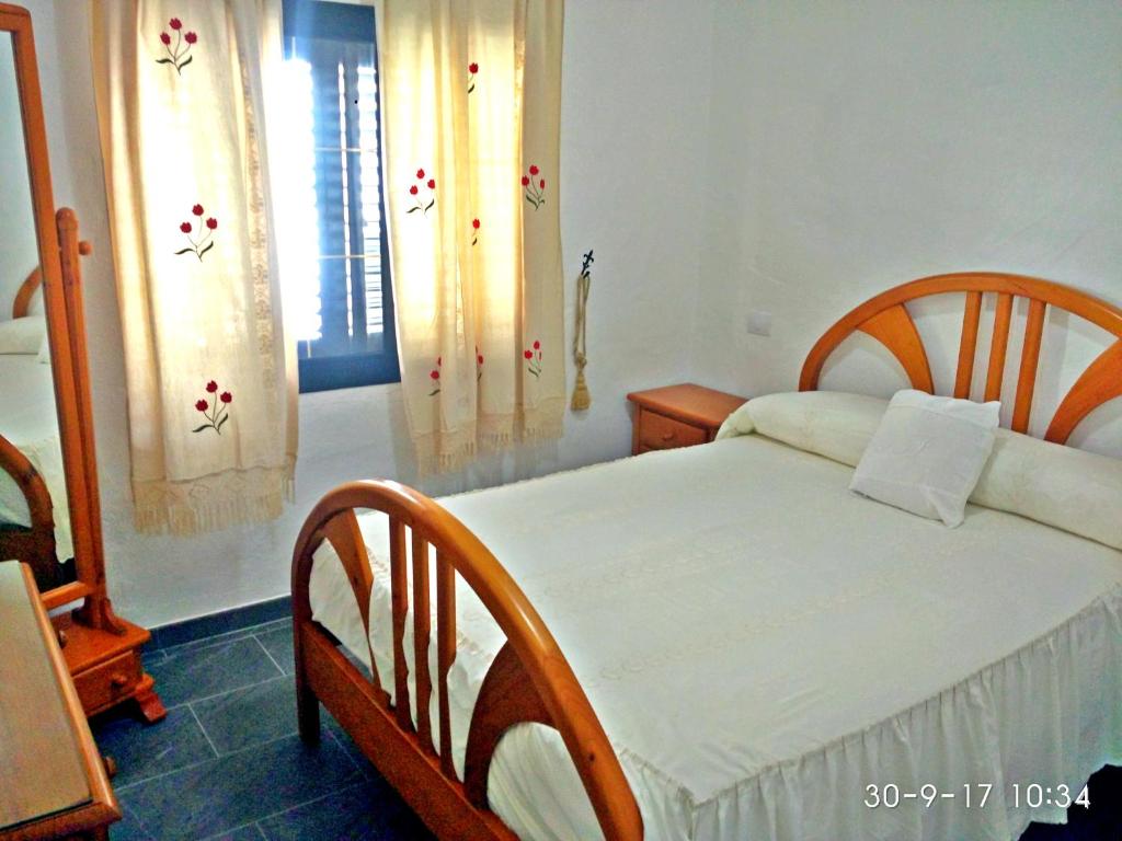 Posteľ alebo postele v izbe v ubytovaní Ocean Breeze Faro Sardina