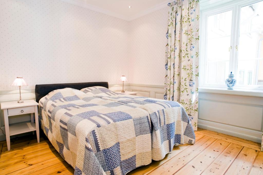 Postel nebo postele na pokoji v ubytování Residence Perseus