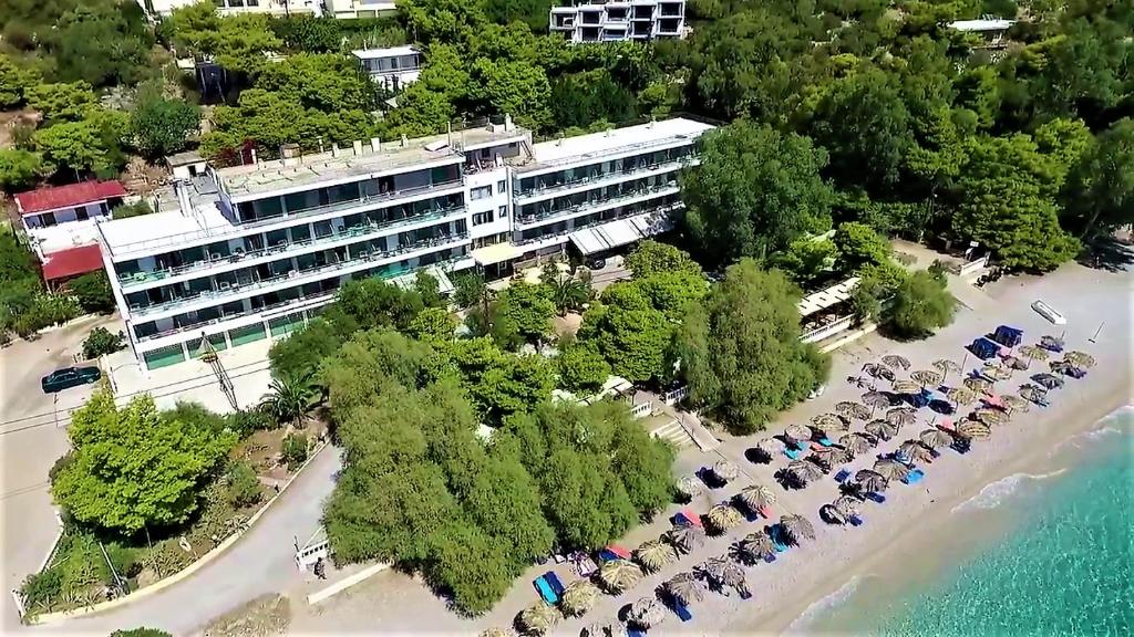 an aerial view of a hotel with a parking lot at SUN HOTEL KINETA Beach Front in Kineta