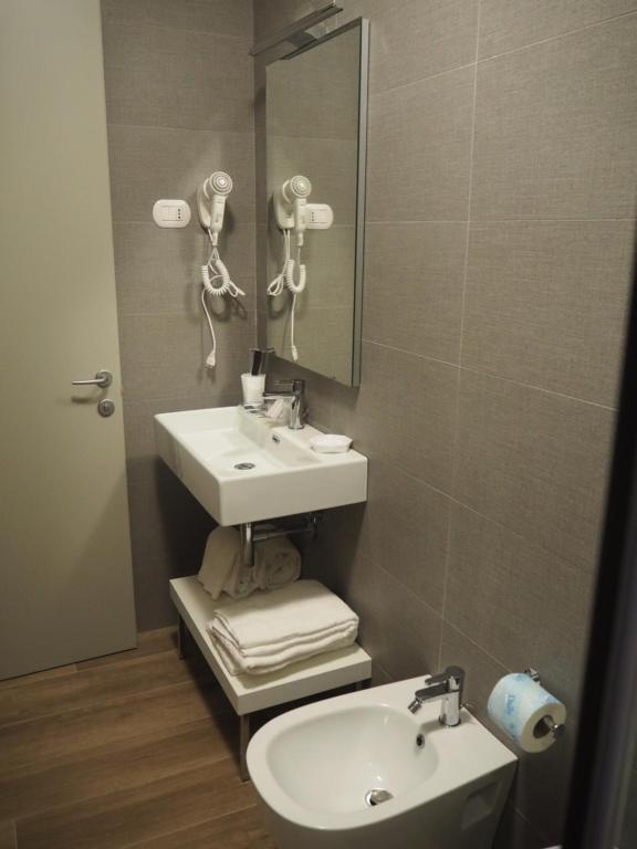 Koupelna v ubytování Oasiclub Hotel