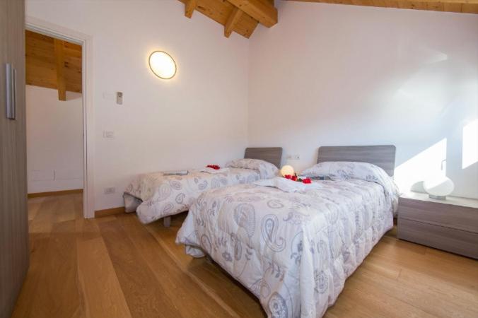 Llit o llits en una habitació de Paradiso del lago