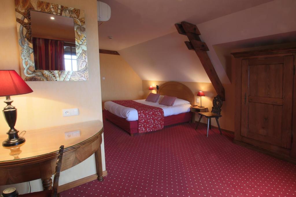 Postel nebo postele na pokoji v ubytování Hotel Restaurant Faller Emmebuckel