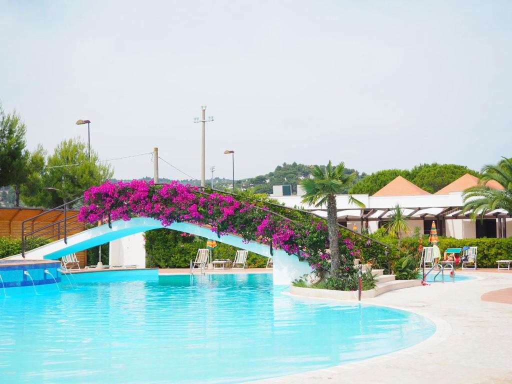 Bazén v ubytování Oasiclub Hotel - Appartamenti nebo v jeho okolí