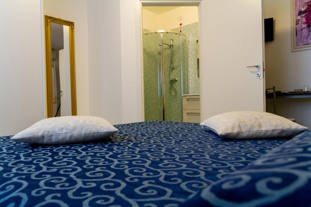 Postel nebo postele na pokoji v ubytování B&B La Rinascita