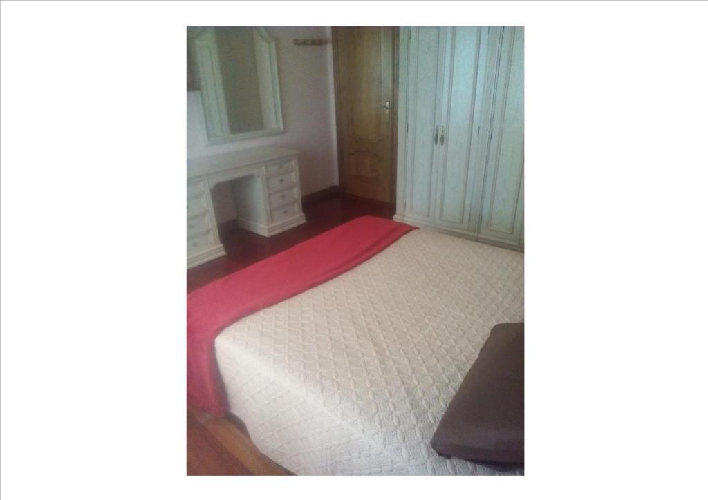 Postel nebo postele na pokoji v ubytování Hogar Laranafran