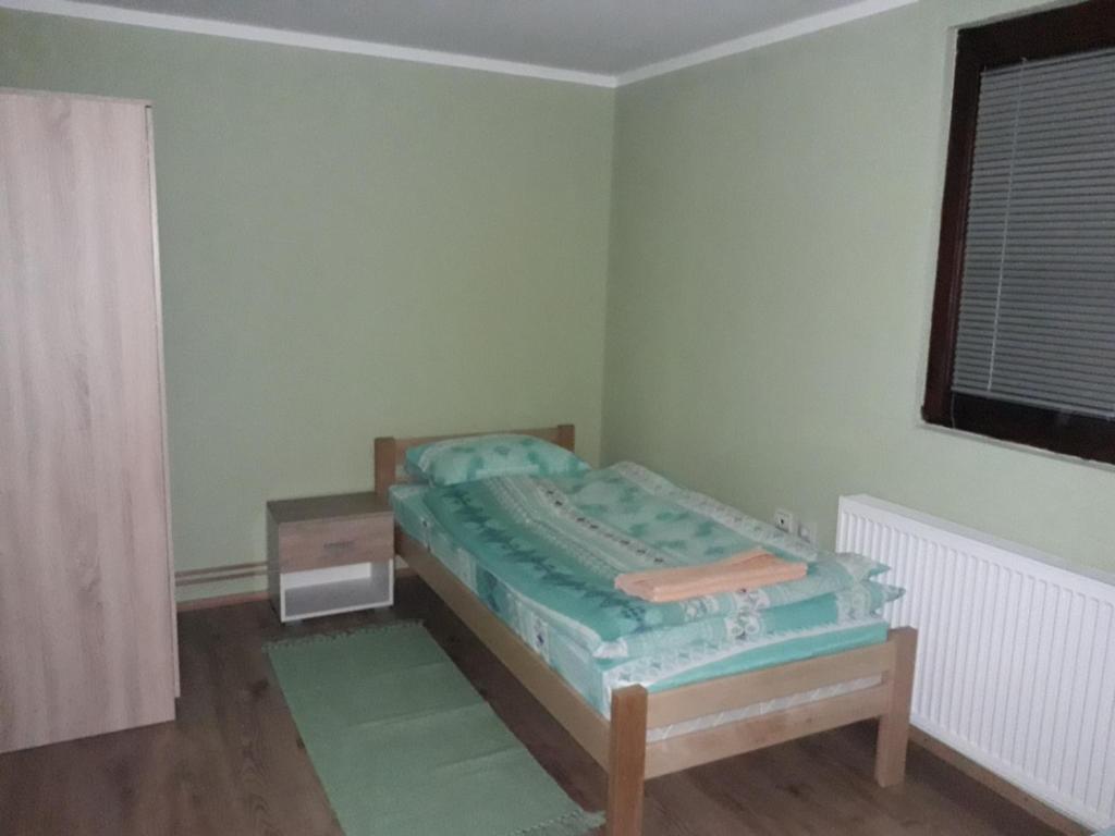 Postel nebo postele na pokoji v ubytování Rooms Violeta