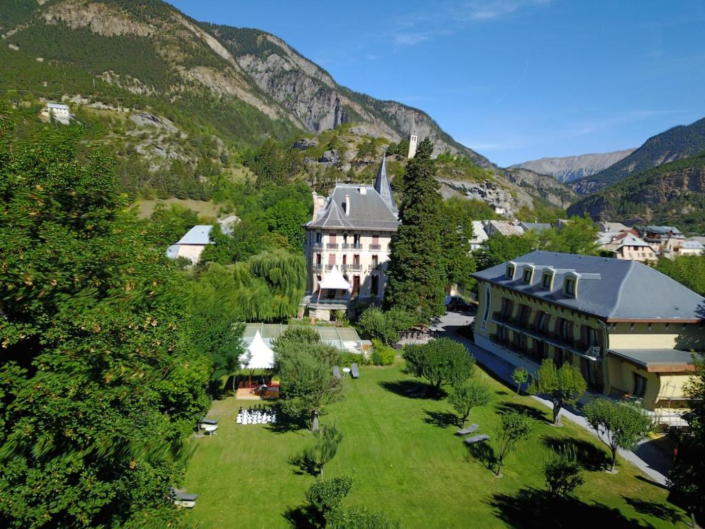 an aerial view of a building in the mountains at Villa Morelia in Jausiers