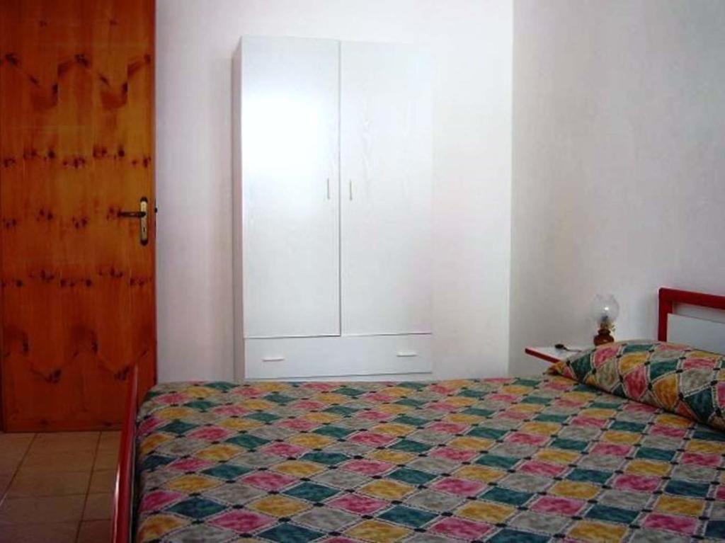 Postel nebo postele na pokoji v ubytování Villa Emidio