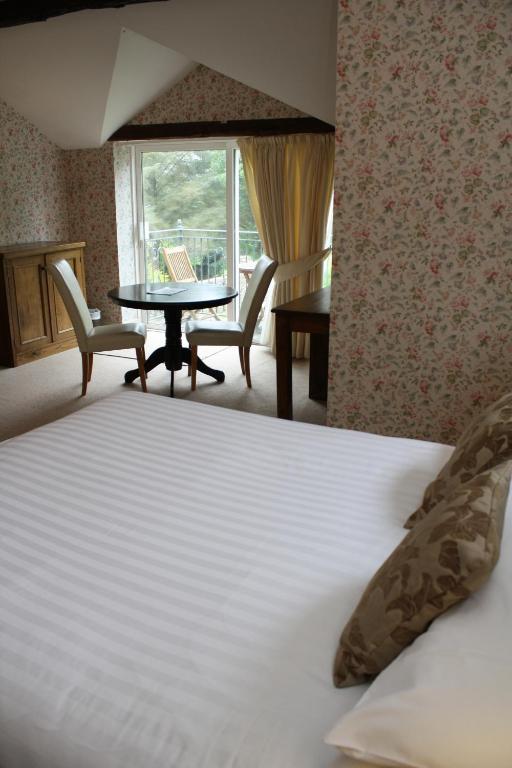 Postel nebo postele na pokoji v ubytování Woodhill House