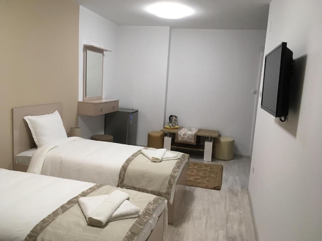 Postel nebo postele na pokoji v ubytování Apartment Park Sveti Vrach