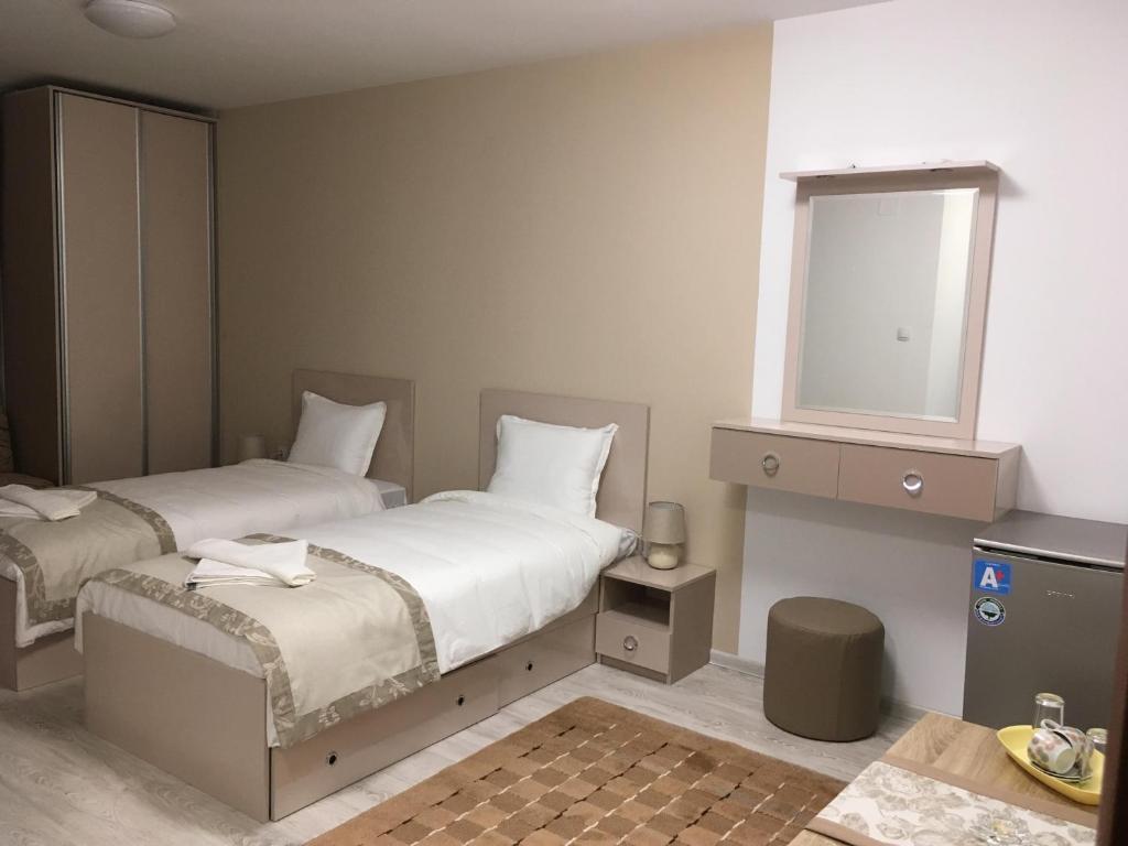 Postel nebo postele na pokoji v ubytování Apartment Park Sveti Vrach
