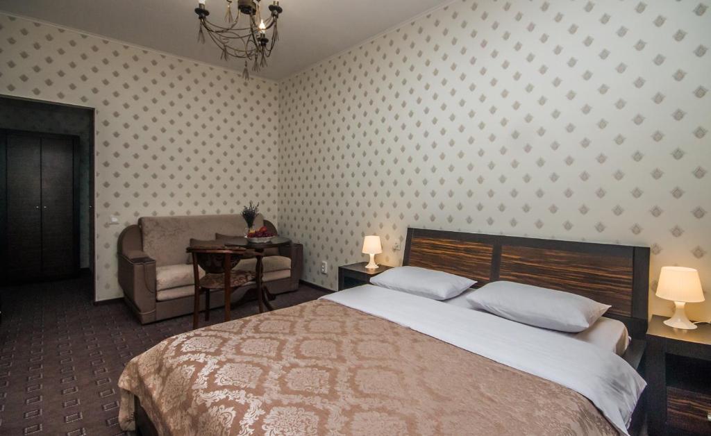 Postel nebo postele na pokoji v ubytování Mini Hotel Ryleev