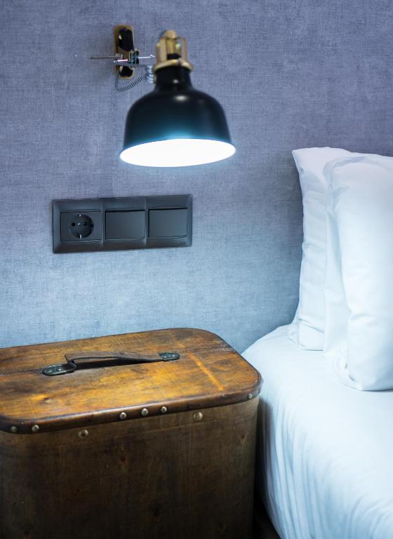 Posteľ alebo postele v izbe v ubytovaní The Lights City Rooms