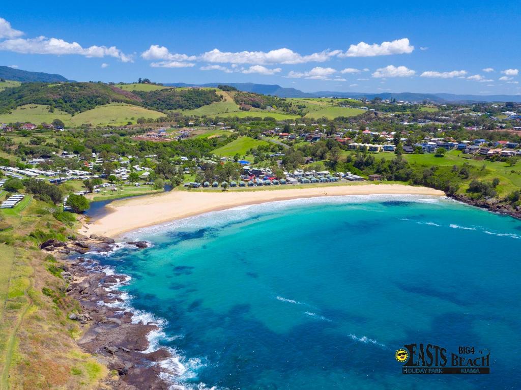an aerial view of a beach with a resort at BIG4 Easts Beach Holiday Park in Kiama