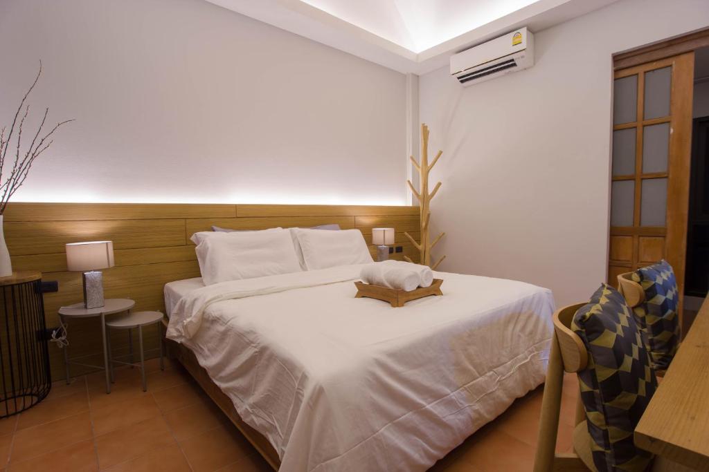 Postel nebo postele na pokoji v ubytování VIYA lodge