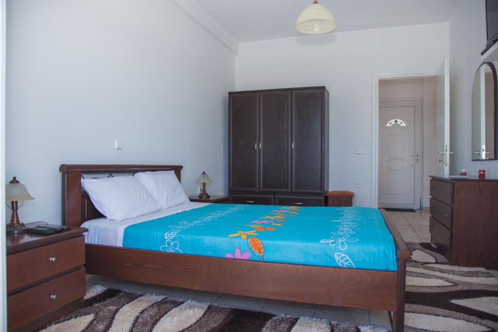 Postel nebo postele na pokoji v ubytování Margarita & Filippos Apartments Corfu