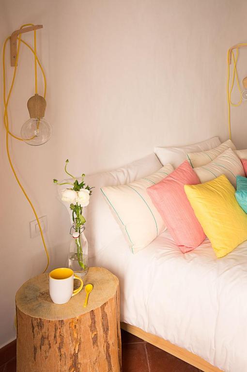 Postel nebo postele na pokoji v ubytování HoMe Hotel Menorca