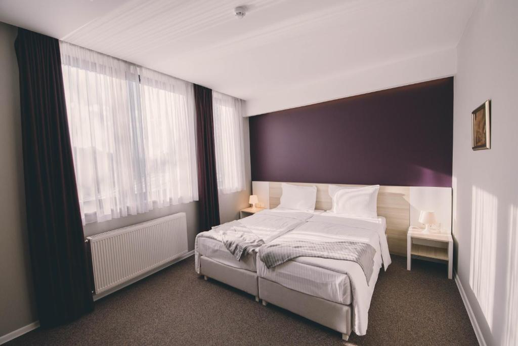 Posteľ alebo postele v izbe v ubytovaní Hotel Nova Bentbaša