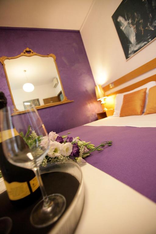 Postel nebo postele na pokoji v ubytování Art Hotel