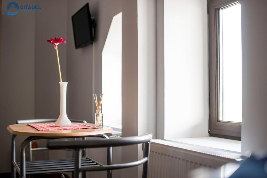 TV a/nebo společenská místnost v ubytování Citadel Aparthotel