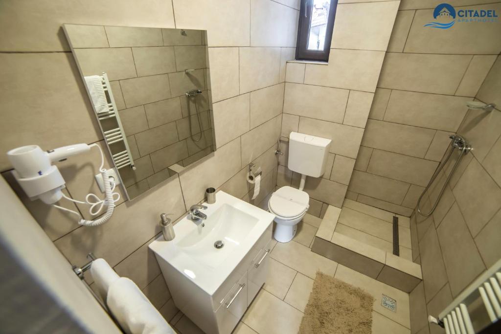 Koupelna v ubytování Citadel Aparthotel