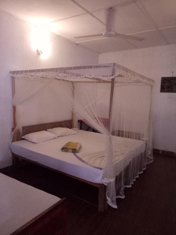 Postel nebo postele na pokoji v ubytování Hansa Surf Hotel