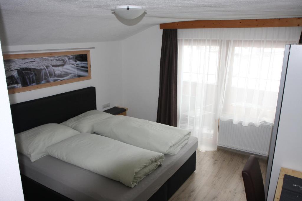 Postel nebo postele na pokoji v ubytování Haus Eckhart