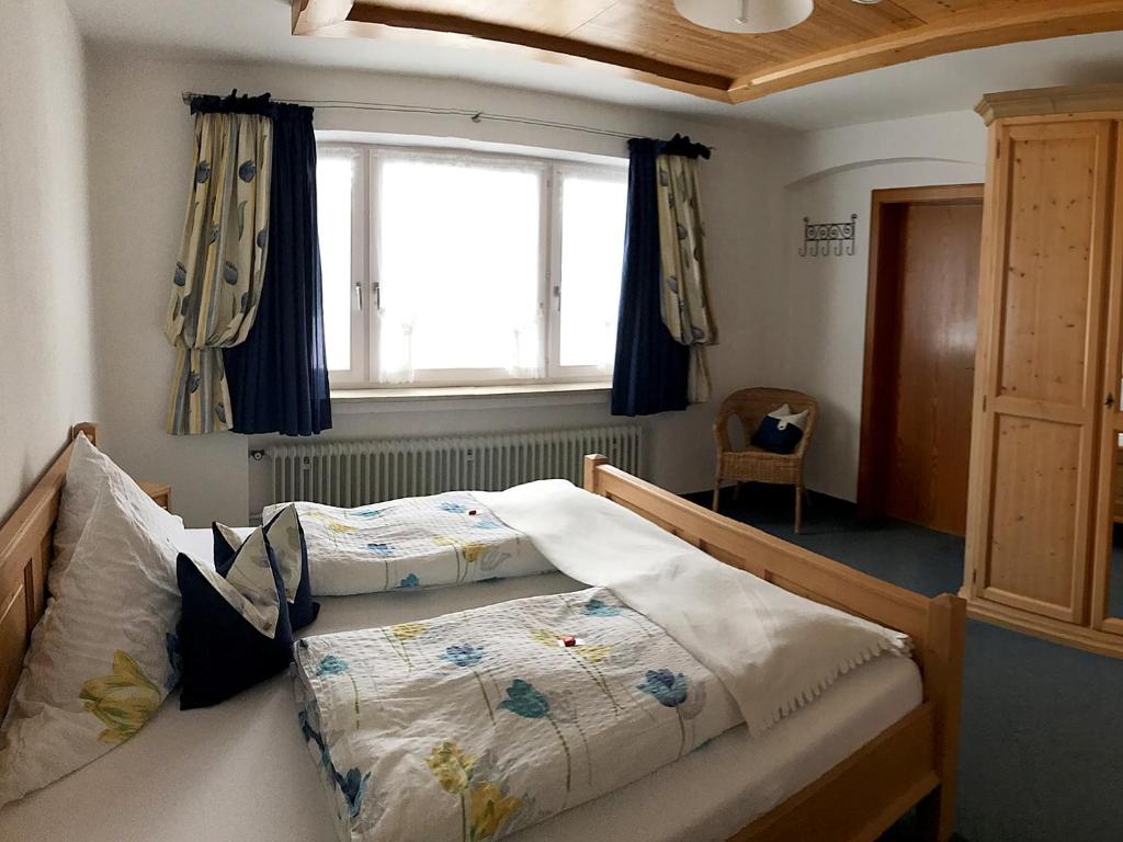 Postel nebo postele na pokoji v ubytování Gästehaus Pointner