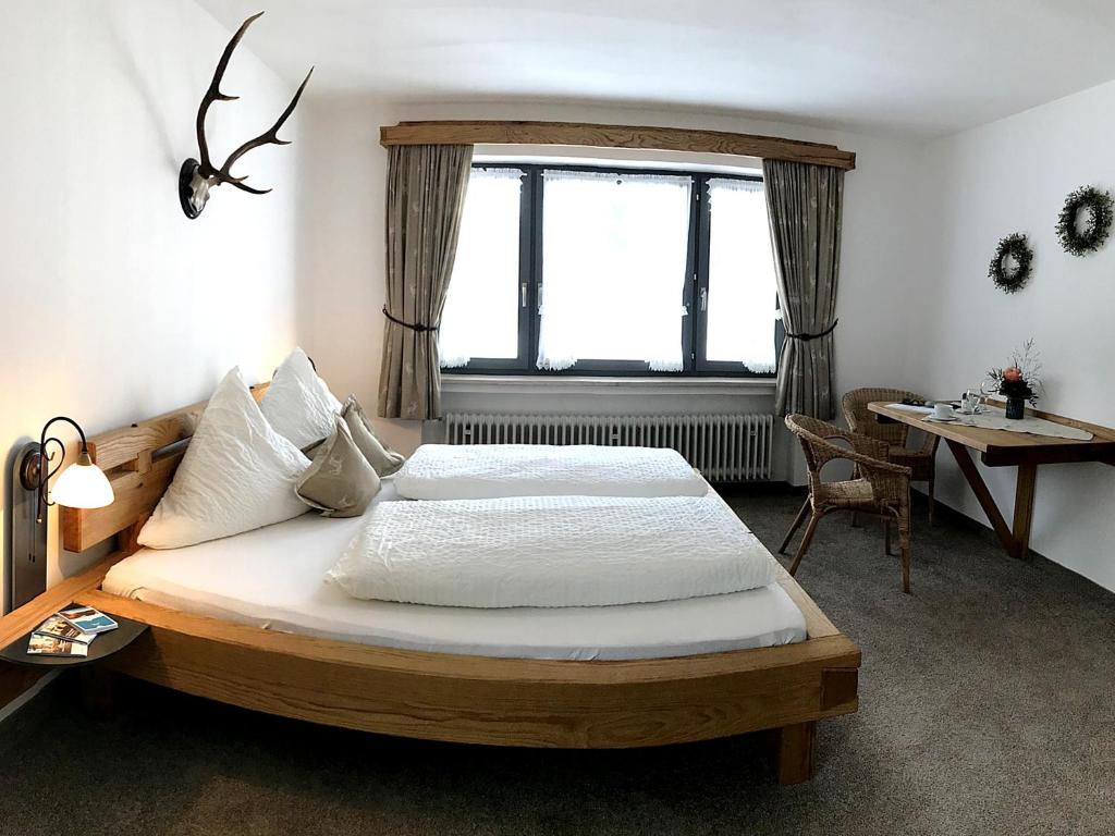 Postel nebo postele na pokoji v ubytování Gästehaus Pointner