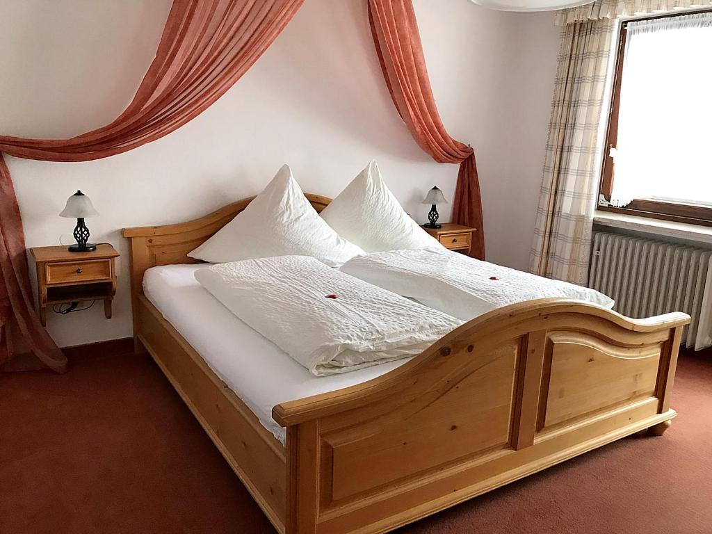 Postel nebo postele na pokoji v ubytování Gästehaus Pointner