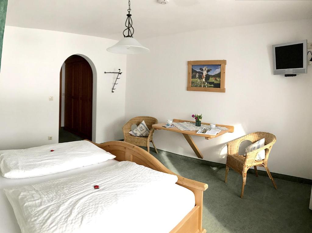 Postel nebo postele na pokoji v ubytování Gästehaus Pointner