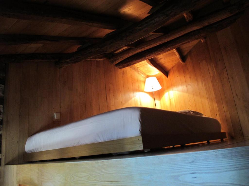 Postel nebo postele na pokoji v ubytování Casa do Talasnal