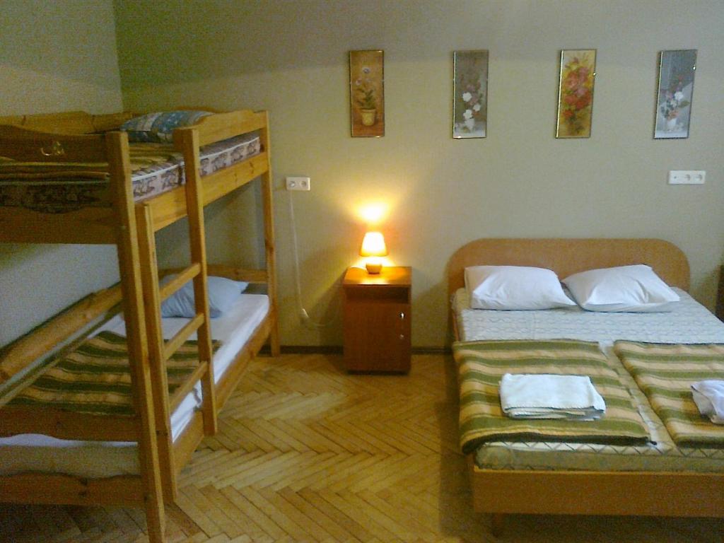 Postel nebo postele na pokoji v ubytování Yaroslav Hostel
