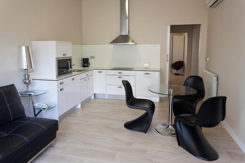 Kuchyň nebo kuchyňský kout v ubytování RuralSuite Hotel Apartamentos