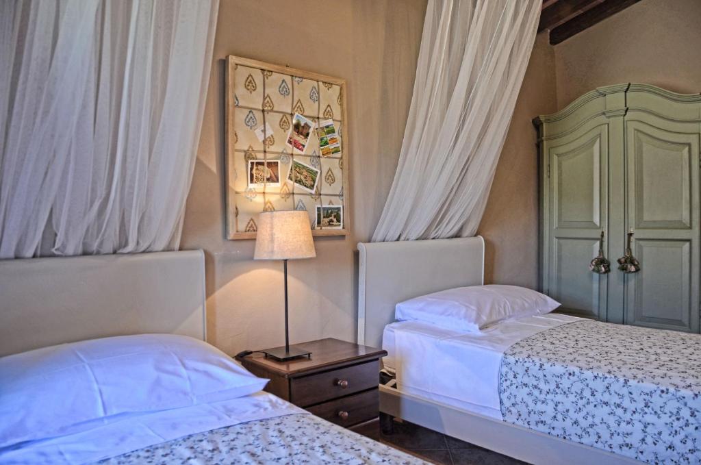 A bed or beds in a room at Agriturismo Piettorri