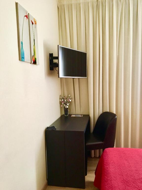 TV a/nebo společenská místnost v ubytování Torrecobijo